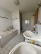 Badezimmer - Charmantes Reihenendhaus mit Garten und Garage in Thann!