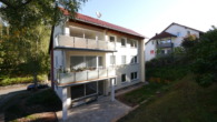 Erstbezug in bevorzugter Wohnlage! 4-Zimmer-Wohnung mit Balkon & Stellplatz in ruhiger Zentrumslage! - Balkonansicht