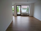 Wohnzimmer - Moderne 1,5-Zimmer-Wohnung mit Balkon in absoluter Zentrumsnähe!