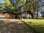 Garagen - Bungalow in Ortsrandlage mit Blick auf Bäume und Natur