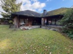 Terrasse - Bungalow in Ortsrandlage mit Blick auf Bäume und Natur