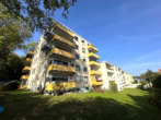Helle 4-Zimmer-Eigentumswohnung mit Balkon und TG-Stellplatz - Gartenansicht
