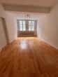 Wohnzimmer - Charmante 3-Zimmer-Altbauwohnung in bester Innenstadtlage